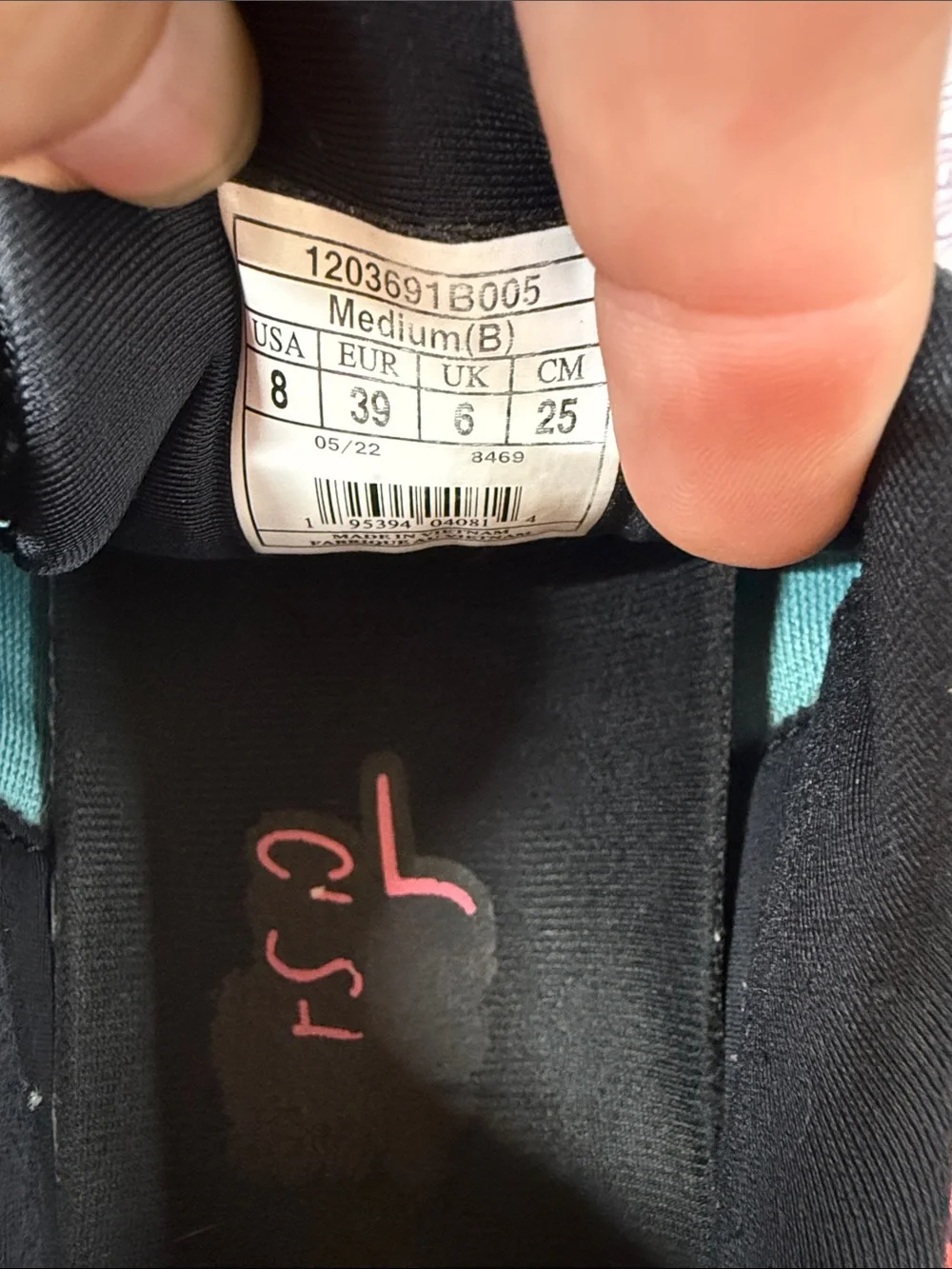 Brooks womens Black Sneakers with Teal and Pink Accents